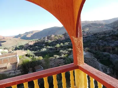 a view of a valley from a window at Dar Essyaha in Ait Ben Ali