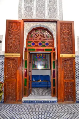 an entrance to a building with an open door at Riad Meyssane Fès in Fès
