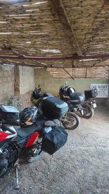 a group of motorcycles parked in a garage at Riad Tazoulte in Agdz