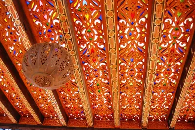 a ceiling with a colorful design on it at Riad Benchekroun in Meknès