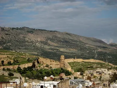 a view of a city with a mountain in the background at Dar Eva in Fès