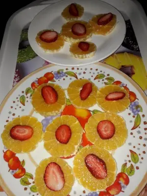 two plates of fruit on top of a table at Nomad Bivouac in Merzouga