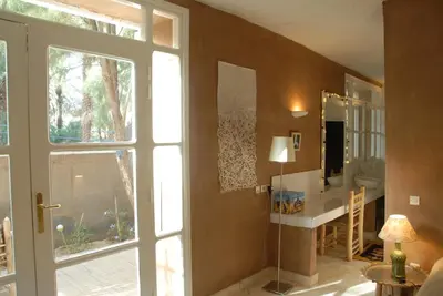 a room with a bathroom with a sink and a mirror at Villa Zagora Ma Villa au Sahara in Zagora