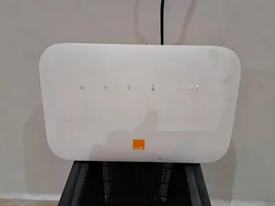 a white toaster sitting on top of a stand at Appartement Au Centre Ville Prés de la Medina in Fès
