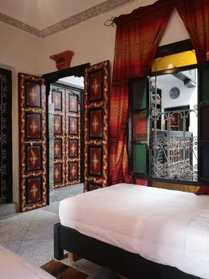 a bedroom with a bed and a window at 105 Kasbah de Boujloud Fes Morocco. in Fès