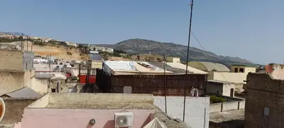 an overhead view of a city with buildings at Riad Dar Mystère in Fès