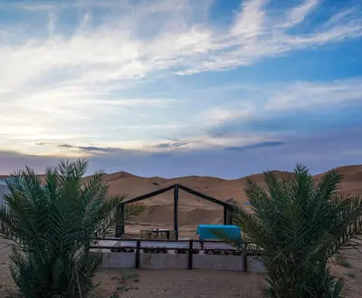 a tent in the middle of the desert at Les Roches Desert Camp in Merzouga
