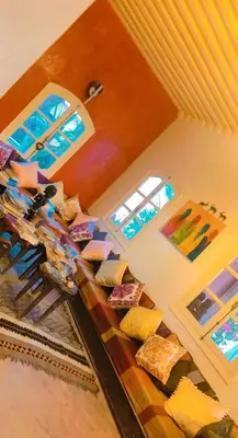 a room filled with lots of pillows on display at Ksar Jenna in Nkob