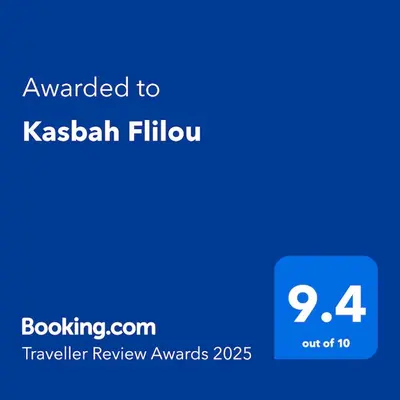 a blue text box with the words awarded to kashak filipilot at Kasbah Flilou in Aït Ougliff