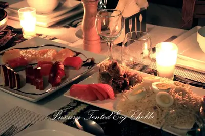 a table with two plates of food on it at Luxury Tented Erg Chebbi in Merzouga
