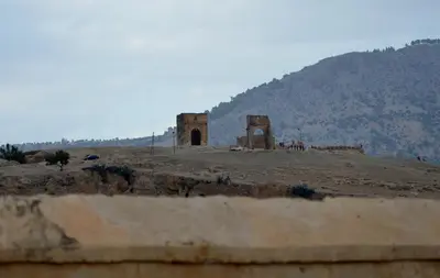 an old building in the middle of a field at Dar Drissi in Fès