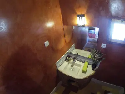 an overhead view of a bathroom with a sink at kasbah 123 soleil in Skoura