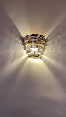 a large ceiling light in a room with clouds at La Villa douce in Marrakech