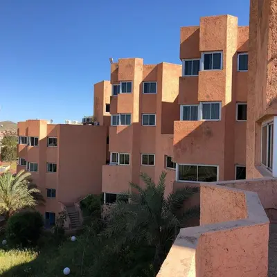 a view of a building in the desert at HOTEL CONTINENTAL Khénifra in Khenifra