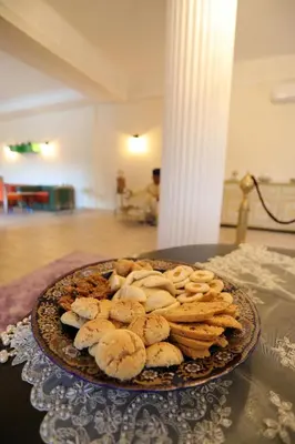 a plate of cookies sitting on a table at Tiguemine Sarah in Marrakech