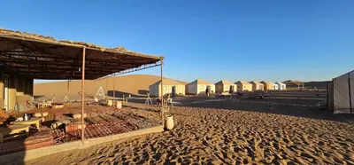 a building in the middle of a desert at Sun Bivouac Chegaga in El Gouera