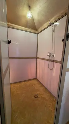 a bathroom with a shower and a walk in shower at Luxury berber style in Merzouga