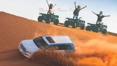 a group of people on motorcycles in the desert at Merzouga Authentic Camps in Merzouga