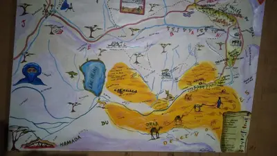 a drawing of a map on a wall at Mhamid Regency Camp in Mhamid