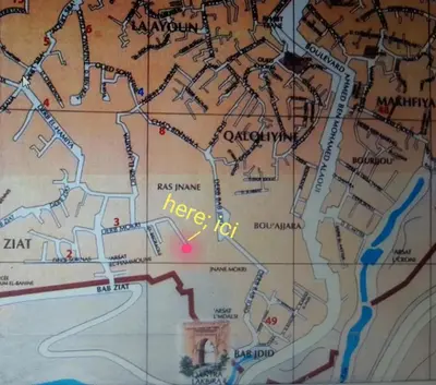 a close up of a map with a red dot at Cosy Apartment in Fes El Bali, 25 m², Private Garden in Fès