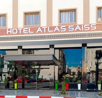 a hotel atlas sales sign on a building at Hôtel Atlas Saiss Fès in Fès