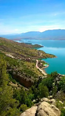 an aerial view of a large body of water at Scenic Lakeview House Near 5-Star Widian Hotel in Bine el Ouidane