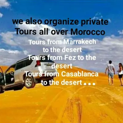 a poster of a car in the desert at Merzouga Desert Luxury Camp in Merzouga