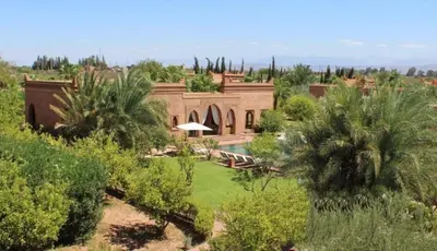 an aerial view of a house with trees at Domaine Casa Cecilia in Marrakech