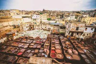 an aerial view of a city with a lot of cars at Charming Riad Ouliya in Fs in Fès