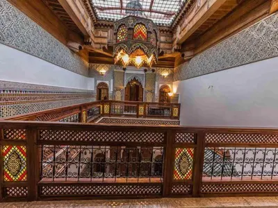 an empty synagogue with a glass ceiling and a staircase at Charming Riad Ouliya in Fs in Fès