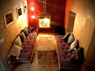 an overhead view of a living room with couches at Maison d'hôte ''J'' in Agdz