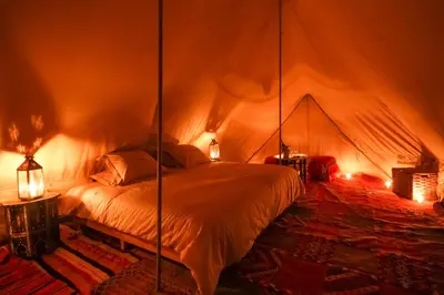 a bedroom with a bed in a tent at Exclusive 