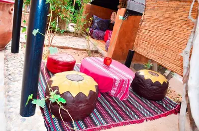 a group of cakes sitting on a blanket at Kasbah Tussna in Boumalne