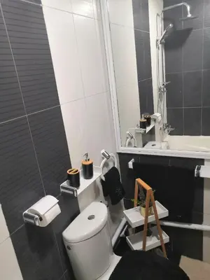 a bathroom with a toilet and a sink and a tub at Luxury apart in Fes monumental Exclusively for the family in Fès