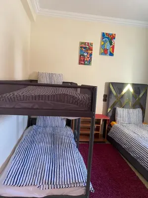 a room with two bunk beds in a room at DARY in Fès