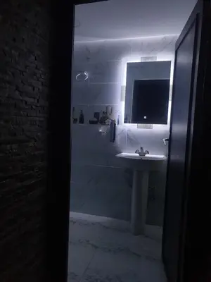 a bathroom with a sink and a mirror at White House in Azrou