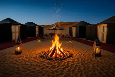 a fire pit in the middle of the desert at Ame camp in Merzouga