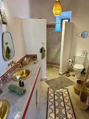 a bathroom with a sink and a toilet at VILLA BEL'VIE, PRIVEE, MARRAKECH , PISCINE CHAUFFEE, Wifi, Clim in Douar bel Rhanodour