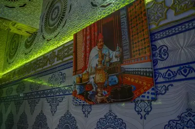 a painting of a pope on a wall at LA casa Dar Rayan in Fès