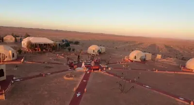 an aerial view of a camp in the desert at Tatooine Stars Camp in Merzouga