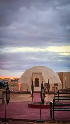 a large tent in the middle of the desert at Tatooine Stars Camp in Merzouga
