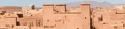 a group of buildings in the middle of a city at Le Sauvage Noble in Tissergat