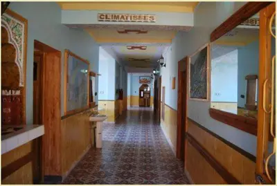 a hallway of a building with a hallwayngth at Kasbah La Famille Berbère in Boumalne