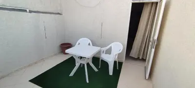 a small table and two chairs in a room at Studio @khémisset in Khemisset