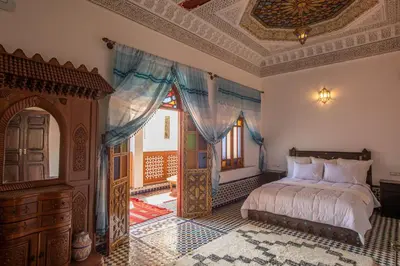 a bedroom with a bed and a ceiling at Riad Sayeda Al Hora in Fès