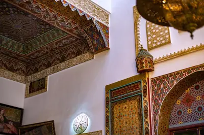 a room with an ornate ceiling and a door at Riad Fes Hayat - Confort Stay in Fès