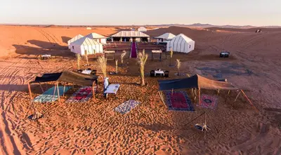 an aerial view of a building in the desert at Luxury Camp Merzouga in Merzouga