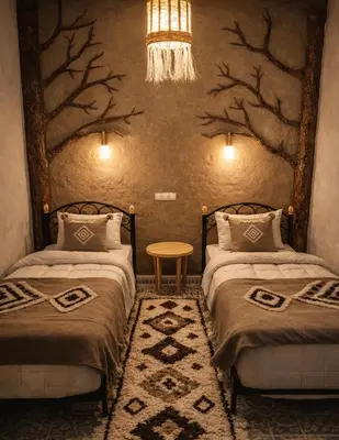 a bedroom with two beds and a chandelier at Chez aubazine in Merzouga