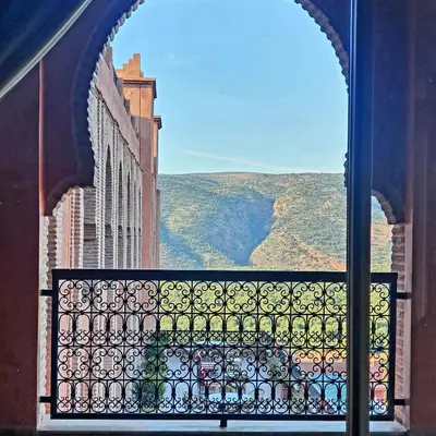 an open window with a view of a canyon at Borj Des Cascades & Spa in Ouzoud