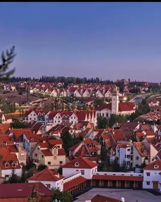 a view of a town with houses and roofs at Maison Jad in Ifrane